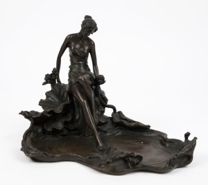 An Art Nouveau style cast bronze statue of a lady and lily pads by a pond, 20th century, ​​​​​​​19.5cm high