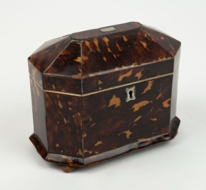 An antique English tortoiseshell tea caddy with silver fittings and ivory trim, interior fitted with two compartments, early 19th century, 13cm high, 17cm wide, 10.5cm deep