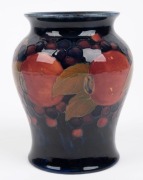 MOORCROFT "Pomegranate" pattern English pottery vase on blue ground, impressed "Moorcroft, Made In England", 14.5cm high - 2