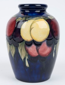 MOORCROFT "Wisteria" pattern English pottery vase on blue ground, impressed "Moorcroft, Made In England", 17.5cm high