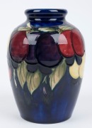 MOORCROFT "Wisteria" pattern English pottery vase on blue ground, impressed "Moorcroft, Made In England", 17.5cm high - 2