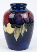 MOORCROFT "Wisteria" pattern English pottery vase on blue ground, impressed "Moorcroft, Made In England", 17.5cm high - 3