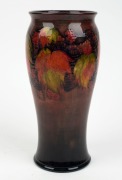 MOORCROFT&nbsp;"Leaf and Blackberry" pattern flamb&eacute; English pottery vase, impressed signature mark "Moorcroft, Potters To H.M. The Queen, Made In England", ​​​​​​​27cm high - 3