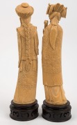 A pair of Chinese&nbsp;carved ivory statues of a Mandarin court official and wife, on carved wooden stands,&nbsp;19th/20th century, ​​​​​​​34.5cm high - 2