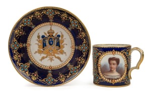 SEVRES stunning antique French porcelain cabinet cup and saucer, sumptuously decorated with three portrait vignettes on blue background with ornate gilt and enamel adornment, 19th century, blue factory mark to base with titles "Diane de Poitiers", "Duchess d'Étampes" and "Boyard", the saucer 14.5cm diameter