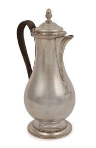 A Georgian sterling silver pear shaped coffee pot with engraved deer's head armorial crest and original leather handle, made in London, circa 1776, 27.5cm high, 692 grams