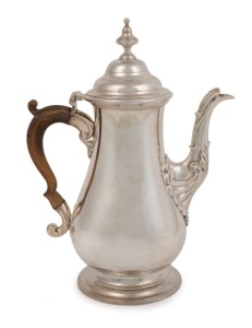 A Georgian sterling silver coffee pot stamped "W.C.", London, circa 1762, ​​​​​​​26cm high, 748 grams total