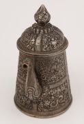 A Bhutanese silver teapot with finely chased decoration, 19th century, ​​​​​​​17cm high, 410 grams - 2