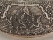 An antique Burmese silver bowl, impressively decorated in fine repousse work, early to mid 20th century. Note: later PAN AMERICAN AIRWAYS inscription to base. 14.5cm high, 25.5cm wide, ​​​​​​​1152 grams - 4