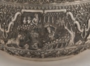 An antique Burmese silver bowl, impressively decorated in fine repousse work, early to mid 20th century. Note: later PAN AMERICAN AIRWAYS inscription to base. 14.5cm high, 25.5cm wide, ​​​​​​​1152 grams - 5