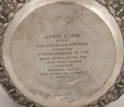 An antique Burmese silver bowl, impressively decorated in fine repousse work, early to mid 20th century. Note: later PAN AMERICAN AIRWAYS inscription to base. 14.5cm high, 25.5cm wide, ​​​​​​​1152 grams - 7