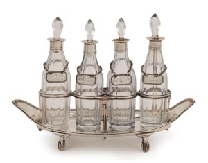 A fine Georgian sterling silver cruet set with four bottles and matched labels including "CHILLI", "KETCHUP", "ANCHOVY" and "CAVICE", by William Southey of London, circa 1828, 16cm high, ​​​​​​​22cm wide