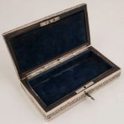 An antique sterling silver jewellery box with repousse decoration interior lined with blue velvet and ebony, by William Comyns of London, circa 1897, with original key, 4.5cm high 18cm wide, 9.5cm deep - 2