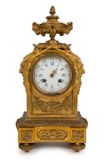 An antique French ormolu cased mantle clock with 8 day time and bell striking movement, 19th century, 37cm high