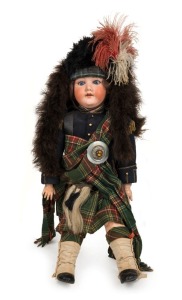 ARMAND MARSEILLES antique German porcelain headed doll in full Scottish regalia, early 20th century, 66cm high overall