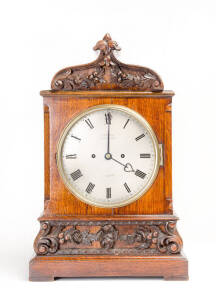 Bracket clock c1850s by Christie of London in a fine Pugin gothic oak case. Double fusee movement. Height 50cm, width 32cm
