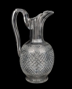 A fine antique English cut crystal wine jug with wheel engraved grape motif, 19th century, 27cm high