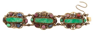 A vintage Chinese gilded filigree silver bracelet, set with carved jade and cabochon coloured stones, circa 1920s, stamped "SILVER", 19cm long