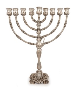 An American 925 silver Chanukiah, early 20th century, stamped "925", 59cm high, 49cm wide, 2,560 grams total