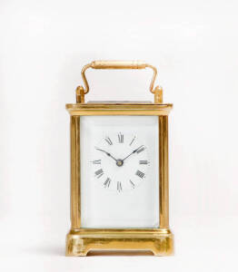 CARRIAGE CLOCK: French late 19th century with Waterbury & Co. retailers stamp on the movement. Height 13.5cm