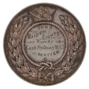 N.S.W. ROWING ASSOCIATION silver medal, engraved verso "1889 MAIDEN EIGHTS Won by East Sydney R.C. J. McIVER (6)" One other example known in the Sir William Sixson Collection at the State Library of N.S.W. The New South Wales Rowing Association (NSWRA) wa