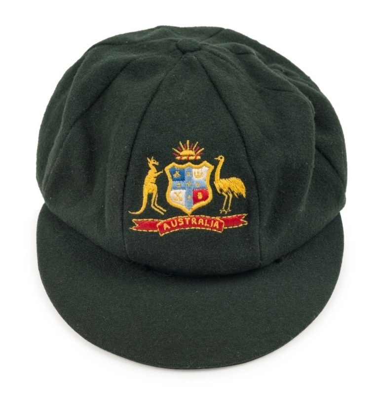 THE AUSTRALIAN BAGGY GREEN WORN BY KIM HUGHES DURING HIS FINAL TEST MATCH AS CAPTAIN, DECEMBER 1984 Kim Hughes, in his final Test and final Test as Captain, exchanged this cap with Clive Lloyd, the West Indies captain, who was also in his last Test Match