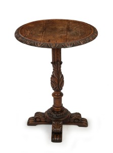 An antique English oak round occasional table in the Jacobean style, 19th century,