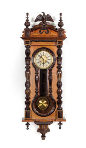 VIENNA REGULATOR: Late 19th century wall clock in ornate walnut case with eagle finial & pressed metal Art Nouveau dial. Height 145cm