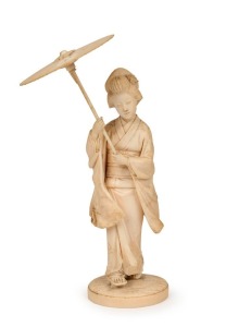 An antique Japanese carved ivory Geisha Okimono, Meiji period, 19th/20th century, seal mark to base, 22cm high