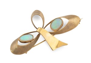 A vintage Australian 9ct yellow gold brooch set with two solid opals, circa 1960s, 7cm wide, 9.3 grams total