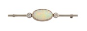 An Australian Art Deco 18ct white gold brooch, set with a stunning solid white opal, flanked by two brilliant cut white diamonds, early to mid 20th century, ​​​​​​​maker's marks rubbed, 5.9cm wide, 4.6 grams total