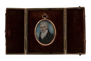 A Georgian hand-painted miniature portrait of a gent painted on ivory, mounted in 9ct rose gold frame and housed in a plush fitted case, early 19th century, 8 x 5.5cm overall, the case 12cm high