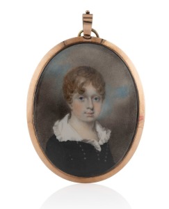 A Georgian hand-painted miniature portrait of a boy painted on ivory, mounted in 9ct rose gold frame, early 19th century, reverse adorned with lock of hair and enamel monogram plaque. 9.5 x 6.5cm overall