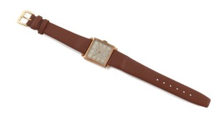 CYPRUS manual wristwatch in square solid 9ct gold case, silver dial, subsidiary second hand, Arabic numerals and brown leather band, circa 1960. 2.7cm wide including crown