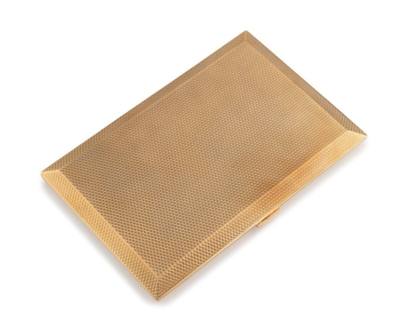 An Art Deco 9ct solid yellow gold cigarette case, circa 1920s, stamped "9, 375", ​​​​​​​13cm wide, 176 grams