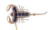 An antique scorpion brooch, 9ct yellow gold, set with ruby eyes, amethysts and white stones, late 19th century,&nbsp; 6cm long, 9.6 grams&nbsp;