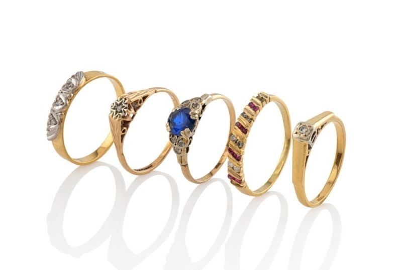 Five assorted gold rings with diamonds and sapphire, (3 marked 18ct), 20th century, 10.5 grams total