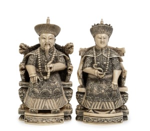 A pair of Chinese carved ivory ancestor statues, 19th/20th century, two character seal mark to the bases, 13.5cm high