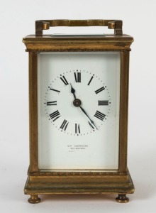 An antique French carriage clock with Roman numerals, retailed by WILLIAM DRUMMOND of Melbourne, 19th/20th century, 15cm high