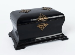 An antique English tea caddy with lacquered black Japanned finish and ornate brass mounts, interior fitted with two compartments with hand-painted simulated walnut finish, 19th century, 12cm high, 23.5cm wide, 15.5cm deep