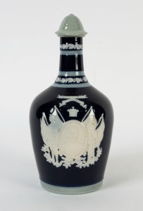 BUCHANAN WHISKEY porcelain decanter with pate sur pate vignette of LLOYD GEORGE, early 20th century, stamped "COPELAND, ENGLAND", 24cm high