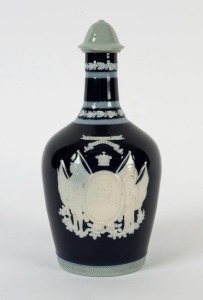 BUCHANAN WHISKEY porcelain decanter with pate sur pate vignette of LLOYD GEORGE, early 20th century, stamped "COPELAND, ENGLAND", 24cm high