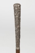 An antique walking stick with Indian silver handle, palm wood shaft and brass ferrule, 19th century, 90.5cm high - 2