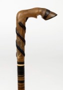 An antique walking stick, carved horn handle with segmented horn shaft and metal ferrule, 19th century, 84cm high - 2