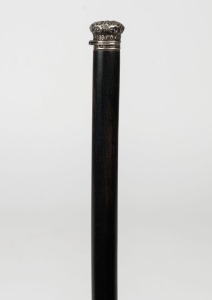 WHISKY CANE antique walking stick with concealed glass whisky tube and cork stopper, hidden under a silver cap, with ebonized shaft and brass ferrule, 19th century, 86cm high