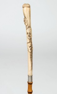 An antique Japanese walking stick with carved bone handle, silver collar, bamboo shaft and brass ferrule, 19th20th century, ​​​​​​​91.5cm high