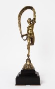 An antique cast bronze statue of a classical female nude, mounted on black slate plinth, 19th century, ​​​​​​​46.5cm high