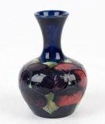 MOORCROFT "Pansy" pattern English pottery miniature vase on blue ground, 9cm high - 2