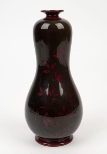 BERNARD MOORE Flambe porcelain vase with foliate decoration, signed "Bernard Moore, Made in England, H. B.", 21.5cm high