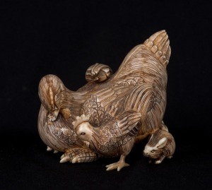 An antique Japanese carved ivory Okimono animal figural group, Meiji period, 19th/20th century, signature to base, 7cm high, 8cm wide